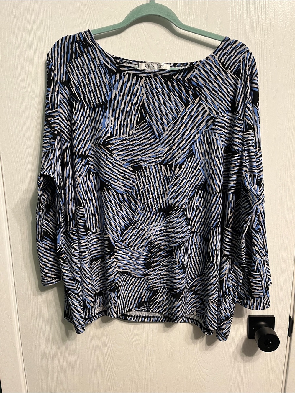 Women’s Kasper 3/4 length blouse with black and blue stripes.